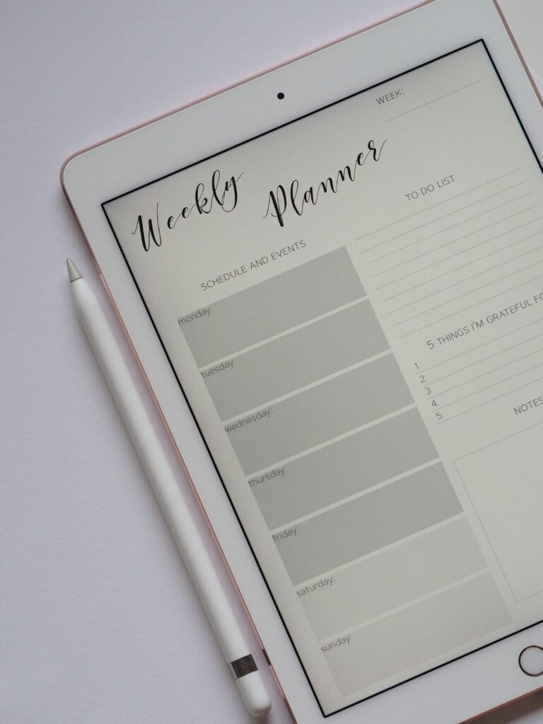 An Ipad open to a daily planner page.