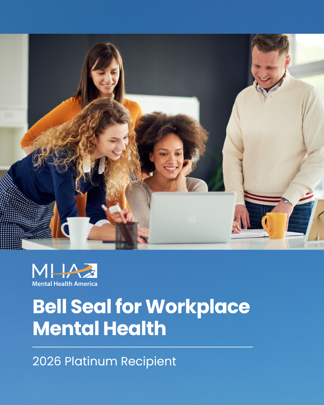 A group of 3 professionals looking at a laptop screen smiling. Underneath are the words Bell Seal for Workplace Mental Health and the MHA National Logo